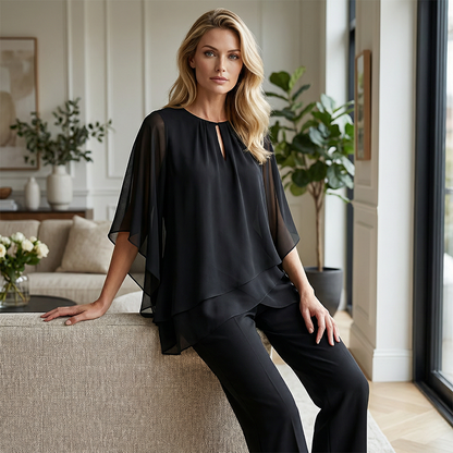 🔥Zolang de voorraad strekt 50% korting!🎉Elegante tweedelige set: blouse met asymmetrische zoom en wijde broek