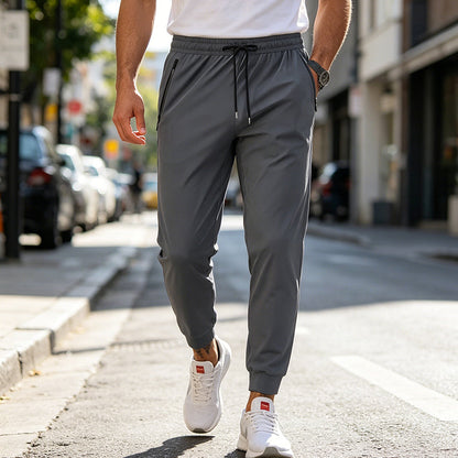 🩳 50% KORTING 🔥 Sneldrogende Heren Sportbroek – 4-Weg Stretch, Ademend & Met Veilige Ritszakken