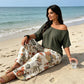 Tweedelige set voor dames: top met blote schouders en broek met print