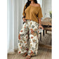Tweedelige set voor dames: top met blote schouders en broek met print