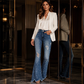 Dames high-waisted distressed flare jeans